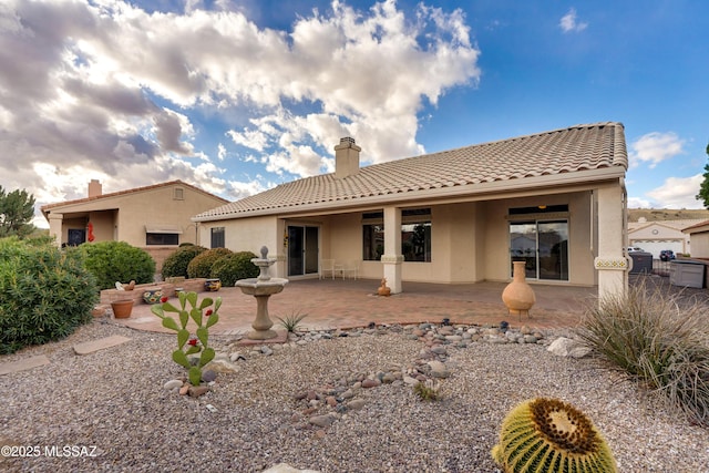 1181 W Placita Lucinda, Green Valley, AZ 85614 - rear view of house with a patio, a chimney, a tile roof, and stucco siding
