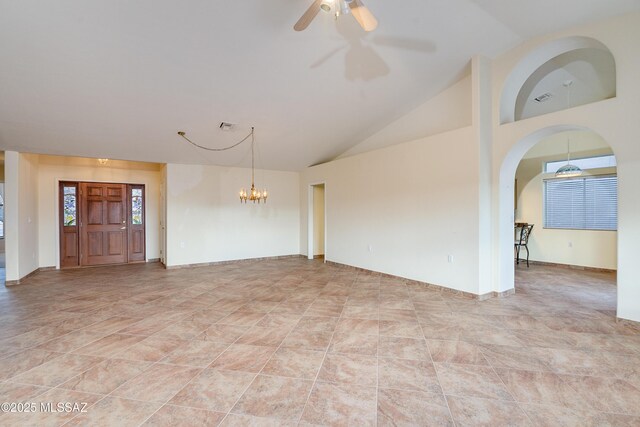 1181 W Placita Lucinda, Green Valley, AZ 85614 - empty room featuring visible vents, ceiling fan with notable chandelier, and high vaulted ceiling