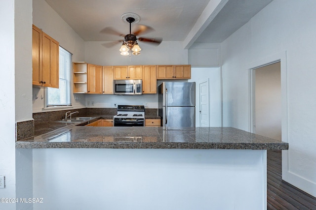 kitchen featuring a peninsula, open shelves, a sink, stainless steel appliances, and tile counters