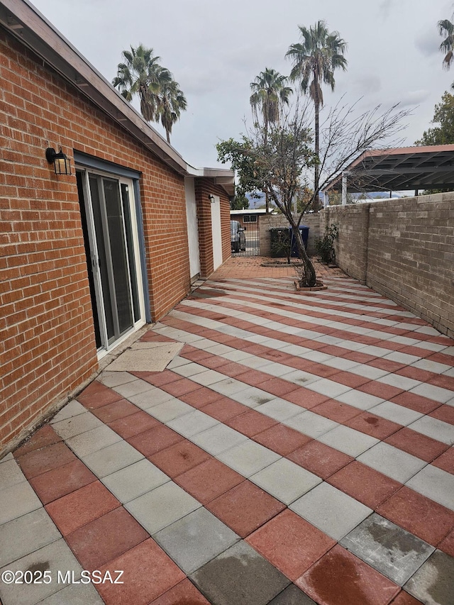 view of patio with fence