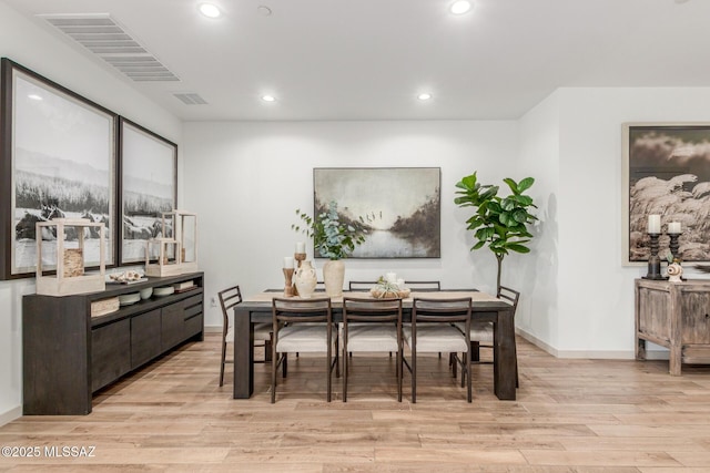 dining area with visible vents, recessed lighting, baseboards, and light wood-style floors