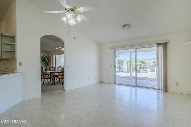 38034 S Golf Course Dr, Saddlebrooke, AZ 85739 - empty room featuring arched walkways, a ceiling fan, visible vents, and plenty of natural light