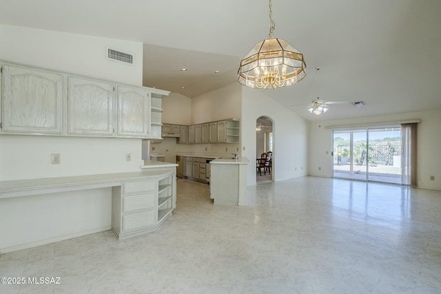 38034 S Golf Course Dr, Saddlebrooke, AZ 85739 - kitchen with a high ceiling, open shelves, visible vents, arched walkways, and open floor plan