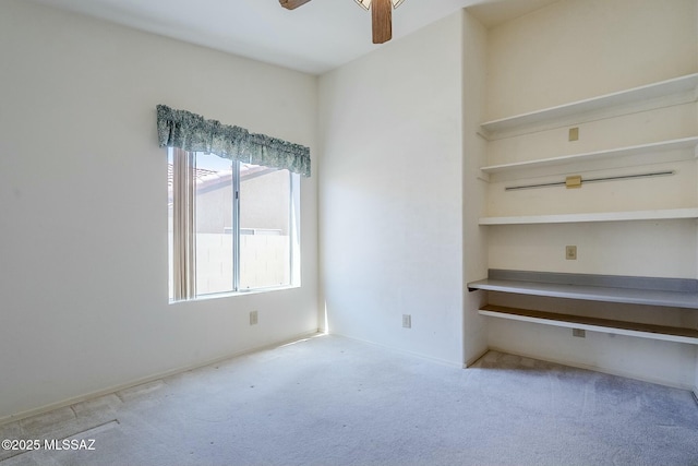 38034 S Golf Course Dr, Saddlebrooke, AZ 85739 - carpeted empty room with baseboards and a ceiling fan