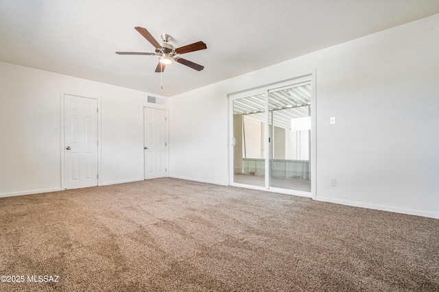 unfurnished bedroom featuring ceiling fan, carpet, visible vents, and baseboards