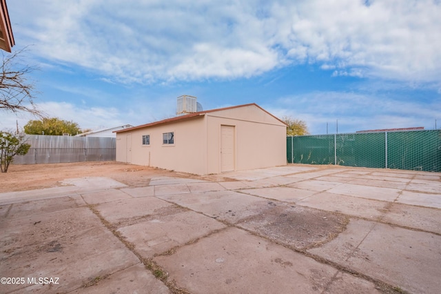 view of outbuilding featuring an outbuilding and a fenced backyard