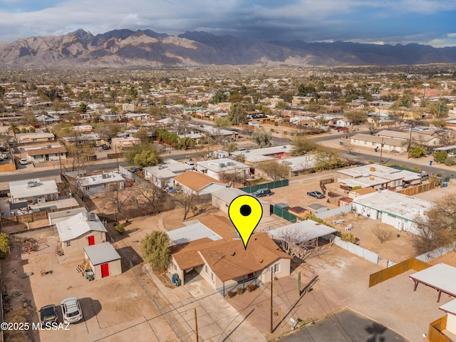 bird's eye view featuring a mountain view and a residential view