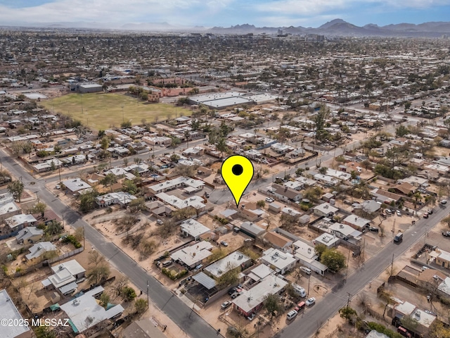 drone / aerial view featuring a mountain view and a residential view