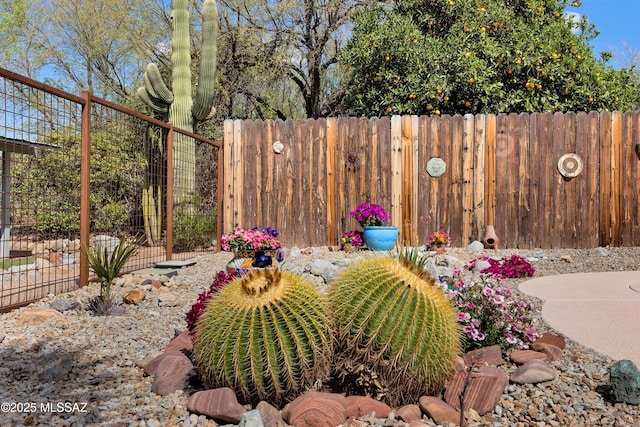 view of yard featuring fence