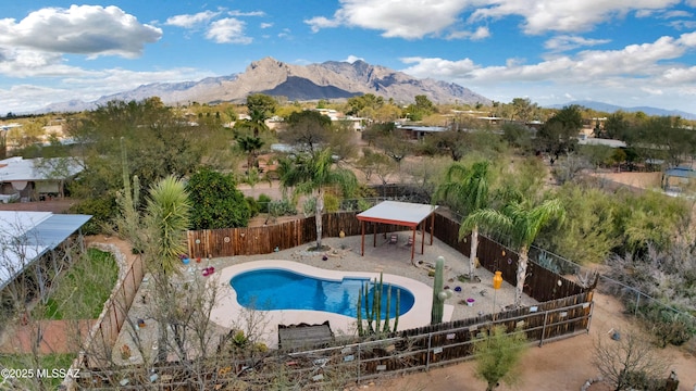 view of pool featuring a gazebo, a mountain view, a patio, and a fenced backyard