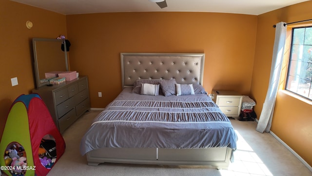 bedroom with baseboards and carpet floors