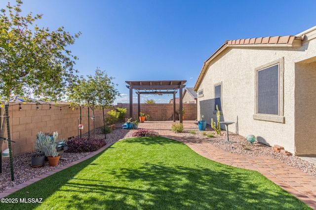 view of yard with a patio, a fenced backyard, and a pergola