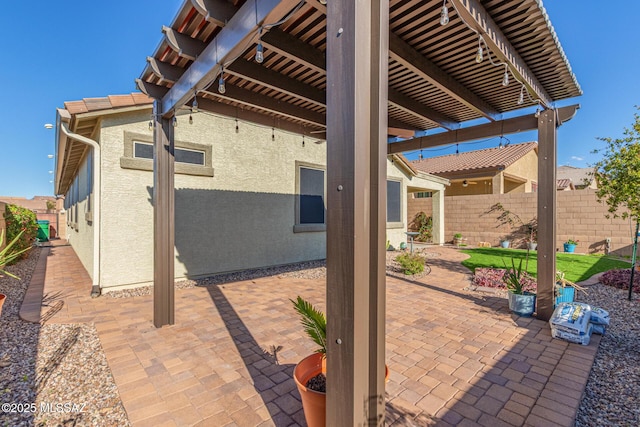 view of patio with fence