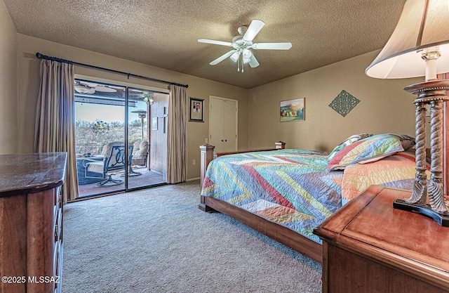 bedroom featuring access to outside, a ceiling fan, carpet floors, and a textured ceiling