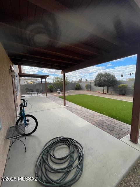 view of patio featuring a fenced backyard