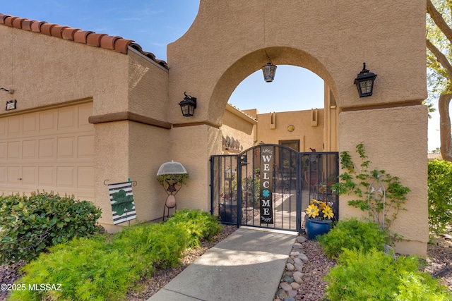 view of gate with fence