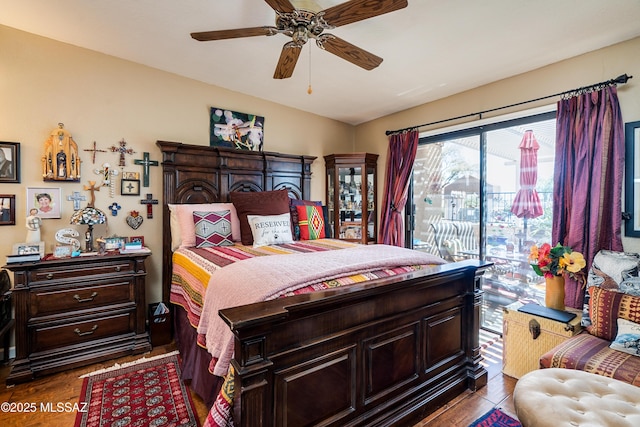 bedroom with access to exterior, ceiling fan, and wood finished floors