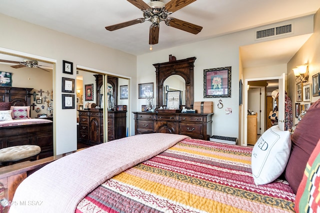 bedroom with visible vents and ceiling fan