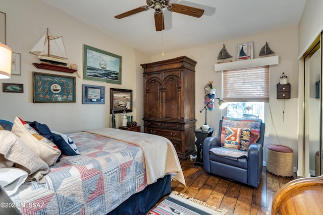 bedroom featuring a ceiling fan and wood-type flooring