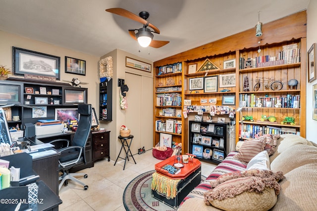 office featuring tile patterned flooring and ceiling fan