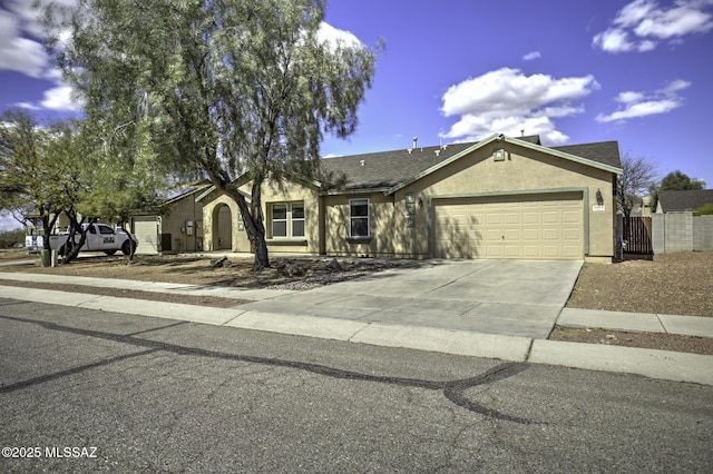 single story home featuring fence, roof with shingles, driveway, stucco siding, and a garage