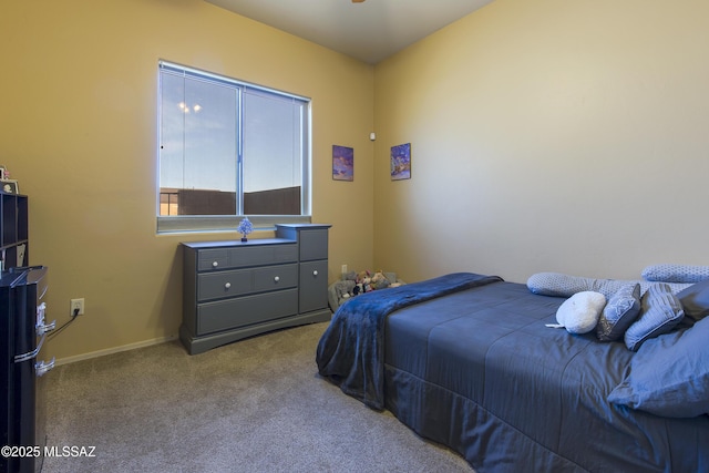 carpeted bedroom with baseboards