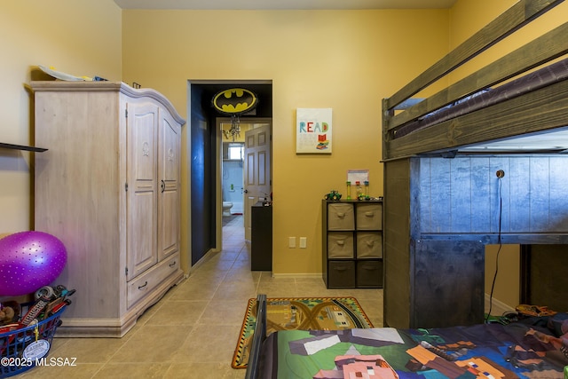 bedroom featuring light tile patterned floors