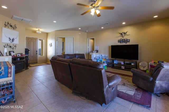 living room featuring tile patterned flooring, recessed lighting, visible vents, and a ceiling fan