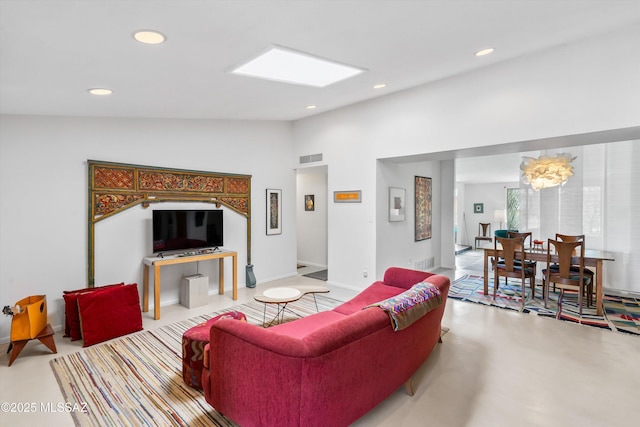 living area featuring lofted ceiling, recessed lighting, visible vents, and concrete flooring