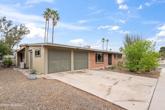 view of front of house with a garage and driveway