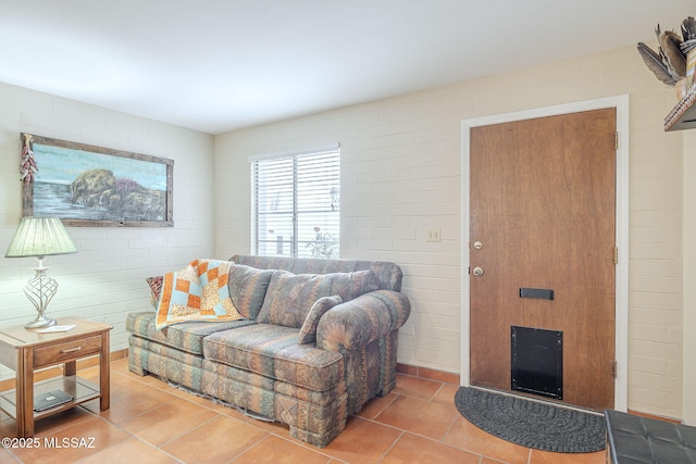 living room featuring light tile patterned flooring