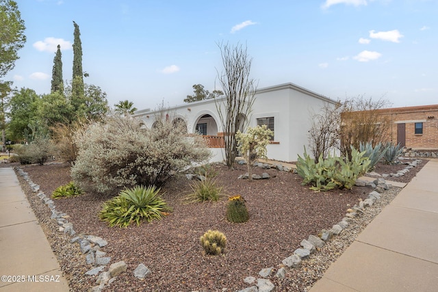 mid-century modern home with stucco siding