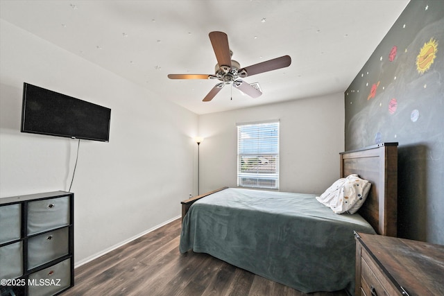bedroom with wood finished floors, baseboards, and ceiling fan