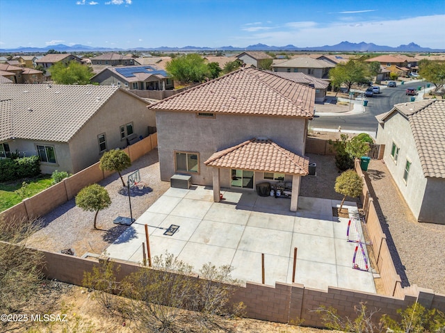 birds eye view of property featuring a residential view and a mountain view