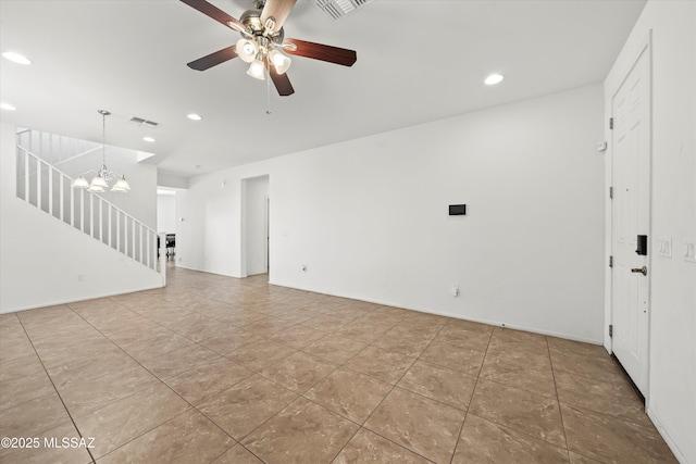 tiled spare room with recessed lighting, visible vents, stairs, and ceiling fan with notable chandelier