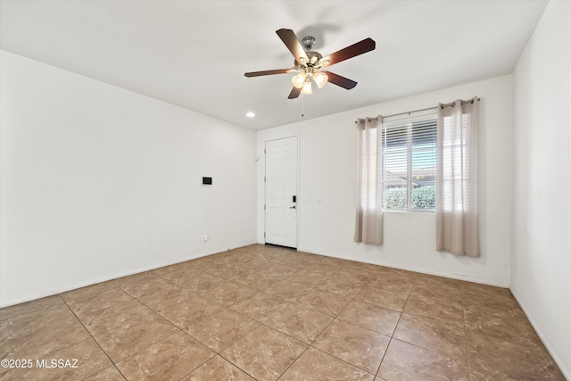 empty room with ceiling fan