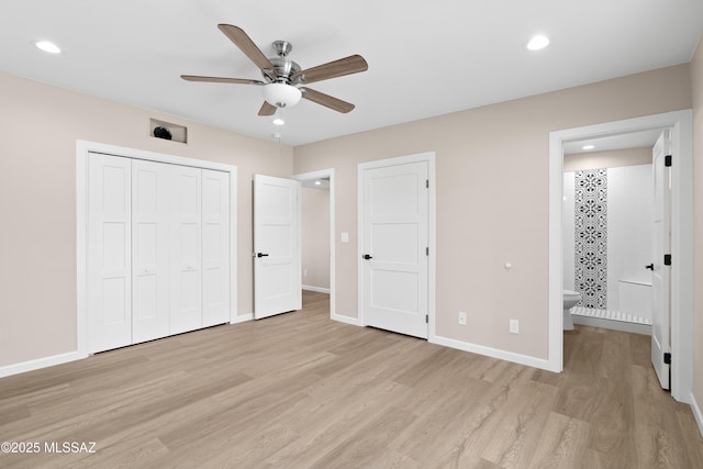 unfurnished bedroom with light wood finished floors, recessed lighting, connected bathroom, and baseboards