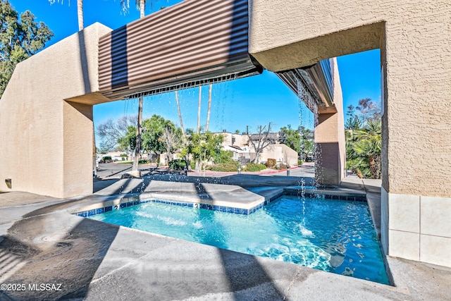 pool with a patio