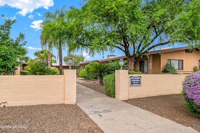 exterior space featuring a fenced front yard