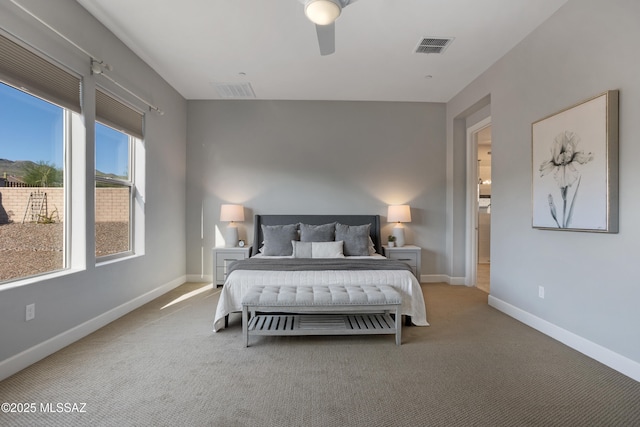 bedroom with visible vents, baseboards, and carpet floors