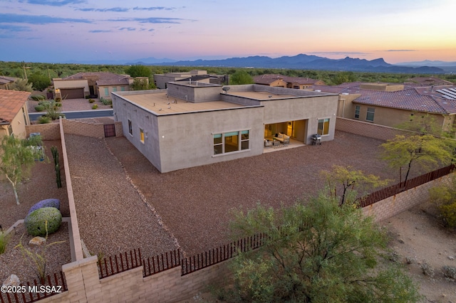 exterior space with a mountain view and a residential view