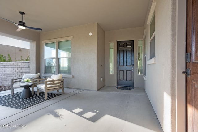 view of patio / terrace featuring ceiling fan