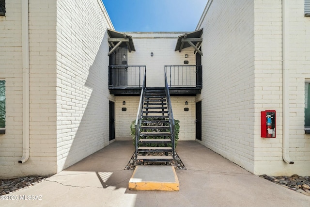 view of building exterior with stairway