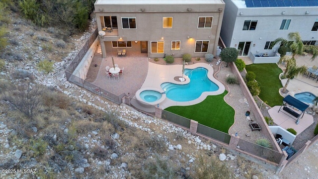 view of swimming pool featuring a fenced in pool, a patio area, and a fenced backyard