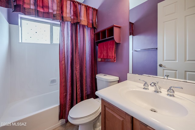 full bath with vanity, shower / bath combination with curtain, and toilet