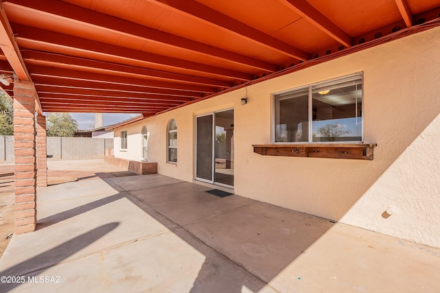 view of patio / terrace with fence