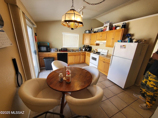 kitchen with under cabinet range hood, white appliances, light tile patterned flooring, and light brown cabinetry