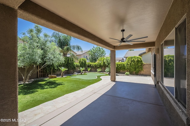 view of patio / terrace featuring a fenced backyard and a ceiling fan