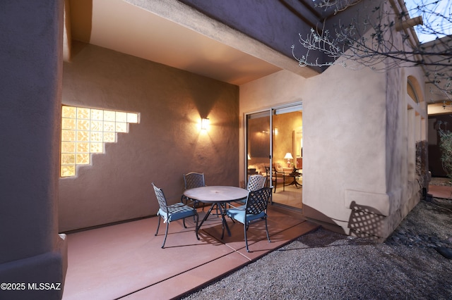 view of patio featuring outdoor dining area