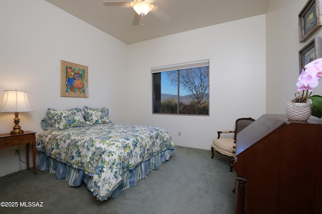 carpeted bedroom featuring a ceiling fan